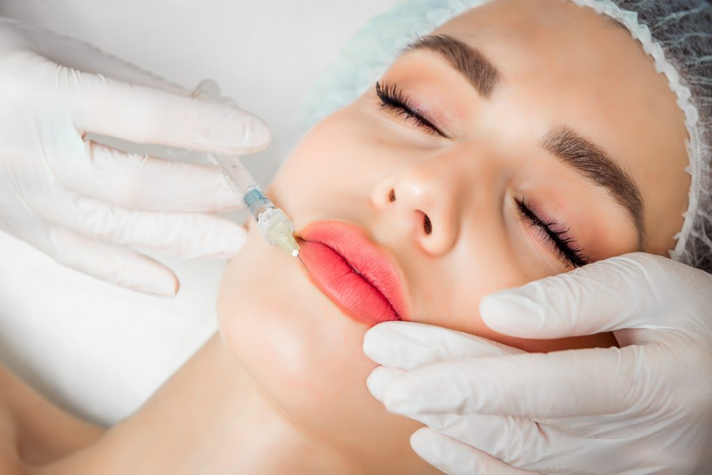 Patient receiving Lip Dissolve Treatment after a consultation at A Aesthetics North Coast